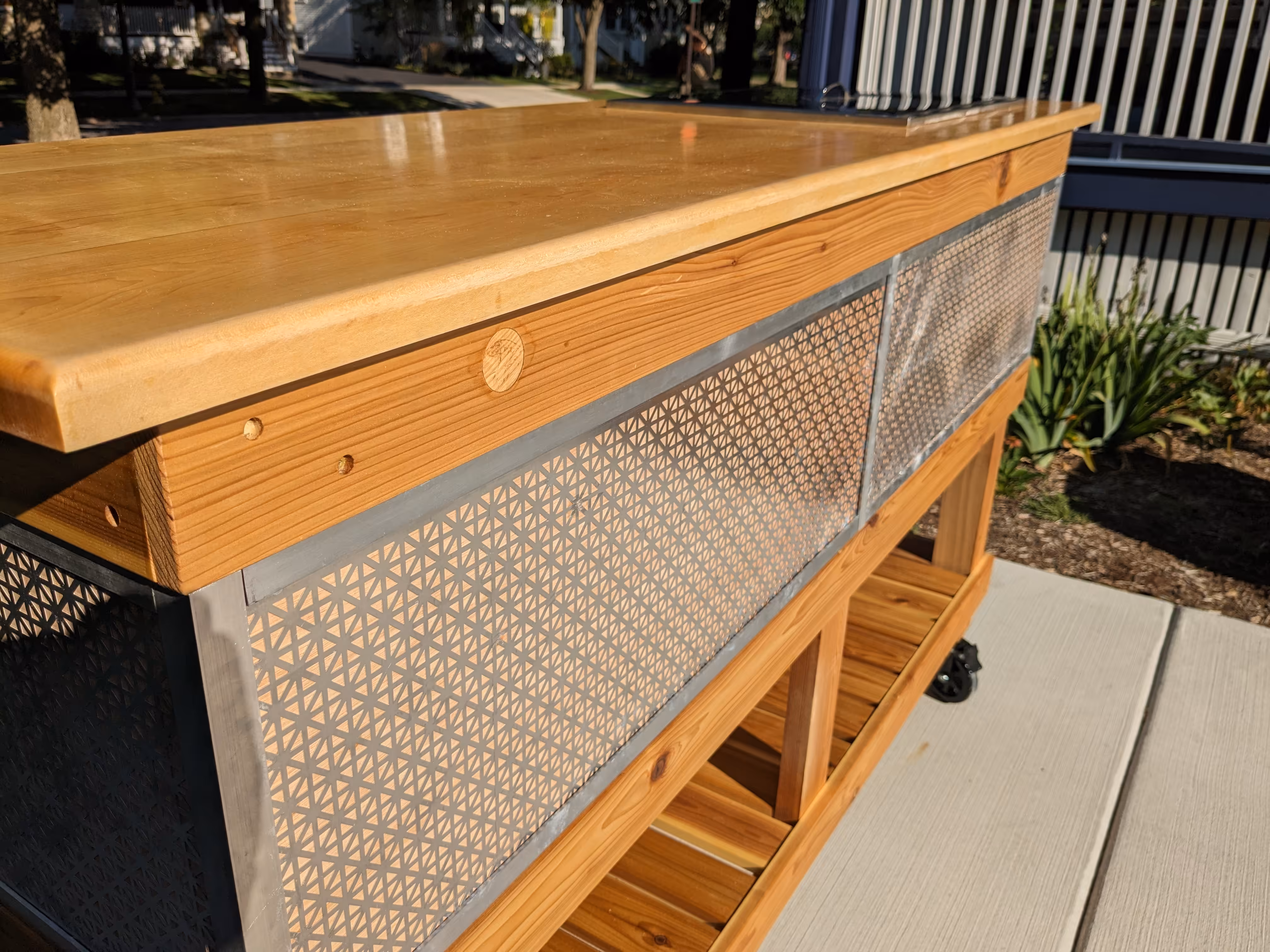 The Betty — a tall slender maple storage cabinet.