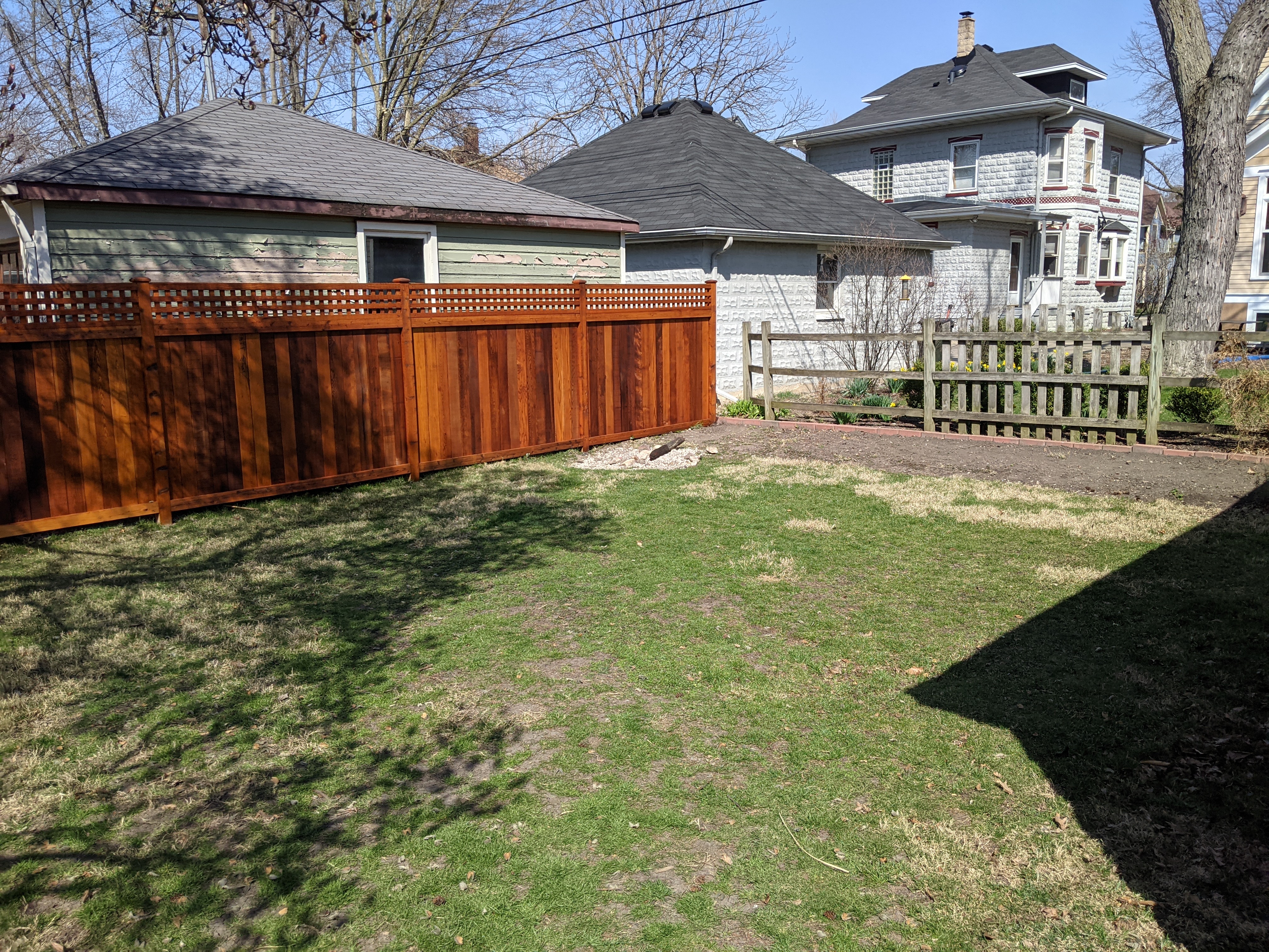 Cedar raised garden boxes early in construction.